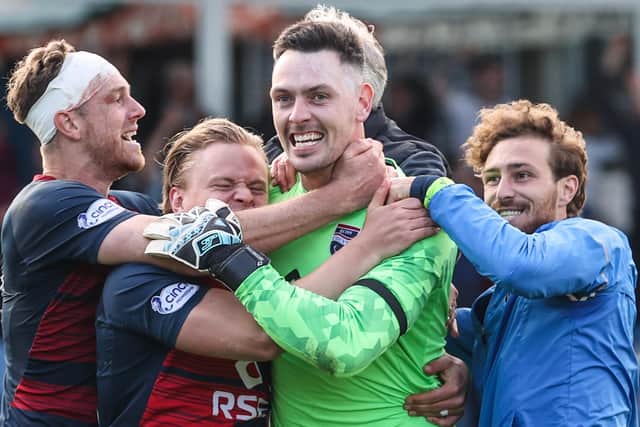 Ross County goalkeeper Ross Laidlaw celebrates with his team after last season's 5-4 penalty shootout win over Partick in play-off final (Pic Craig Williamson/SNS)