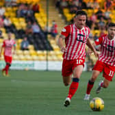 Lewis Vaughan in action against Livingston in the Premier Sports Cup.  (Pic: Scott Louden)