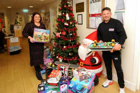Cottage Employee Lana Moffat with Neil Smart who is running the winter-takes all fundraising prize draw on Love Kirkcaldy (Pic: Fife Photo Agency)