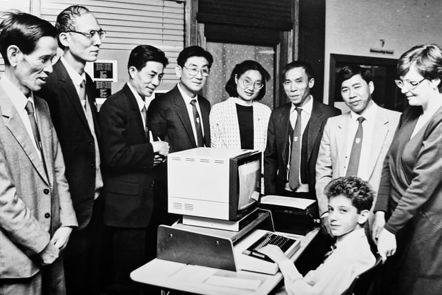 A delegation from China visited Glenrothes in 1988. Their itinerary included a visit to Glenwood High School where this picture was taken. Derek Hutchison, 12, a first year pupil is pictured at the computer, behind him is Mrs Stewart, teacher in charge of the learning resources centre. Picture from the archives of the Glenrothes Gazette.
