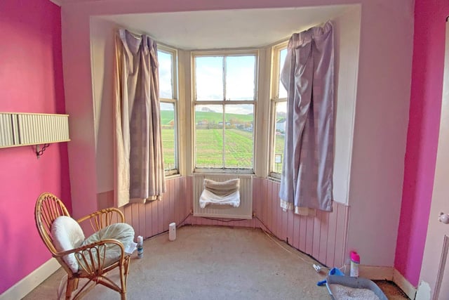 Not so pretty in pink ... but room offers stunning countryside views.