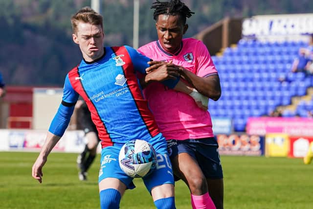 Inverness Caledonian Thistle goal-scorer Jay Henderson, left, and Raith Rovers defender Kieran Ngwenya vying for the ball during the Fifers' 2-0 defeat at the Caledonian Stadium on Saturday (Photo: Simon Wootton/SNS Group)