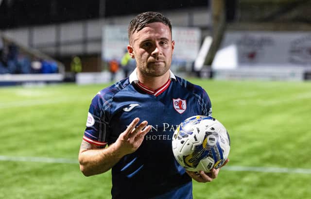 KIRKCALDY, SCOTLAND - DECEMBER 22: Raith's Lewis Vaughan poses with the match ball after scoring a hat-trick during a cinch Championship match between Raith Rovers and Ayr United at Stark's Park, on December 22, 2023, in Kirkcaldy, Scotland. (Photo by Mark Scates / SNS Group)
