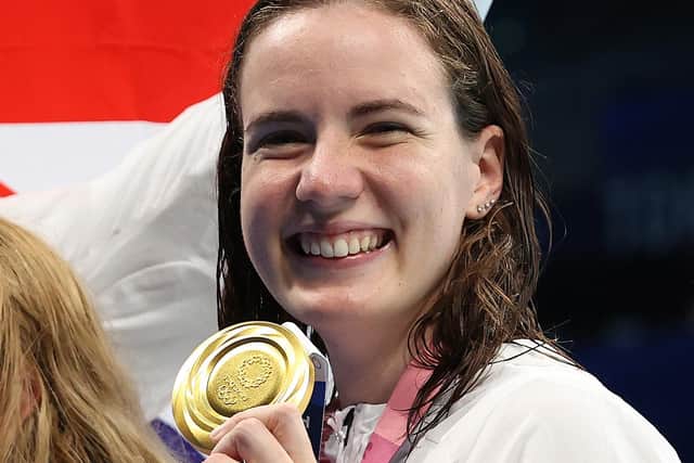 1:  Kathleen Dawson of Team Great Britain poses with her gold medal from the Mixed 4 x 100m Medley Relay (Photo by Ian MacNicol/Getty Images)