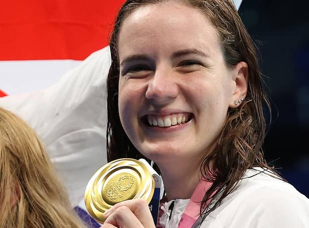 1:  Kathleen Dawson of Team Great Britain poses with her gold medal from the Mixed 4 x 100m Medley Relay (Photo by Ian MacNicol/Getty Images)