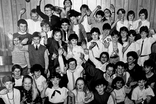 Members of the 103rd Glenrothes Scout group and the 7th  Glenrothes Guide Company held a joint Christmas party in Glenrothes in December 1985. The picture first appeared in the Glenrothes Gazette.