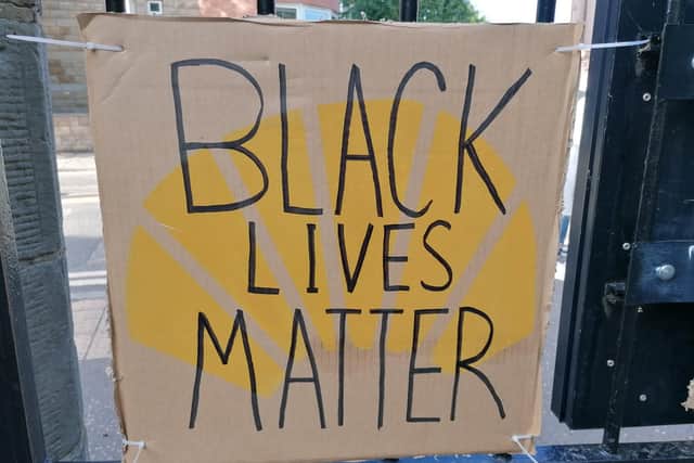 Poster at Black Lives Matter rally held in Holyrood Park, Edinburgh