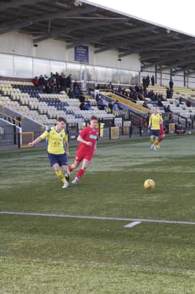 Kirkcaldy and Dysart (in yellow) in possession during Saturday's derby loss (Pic Ross McQuade)