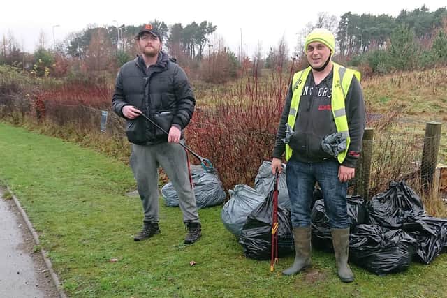 Sean Fairfull (left) and Peter Docherty, collecting litter in Hendry Road, Kirkcaldy