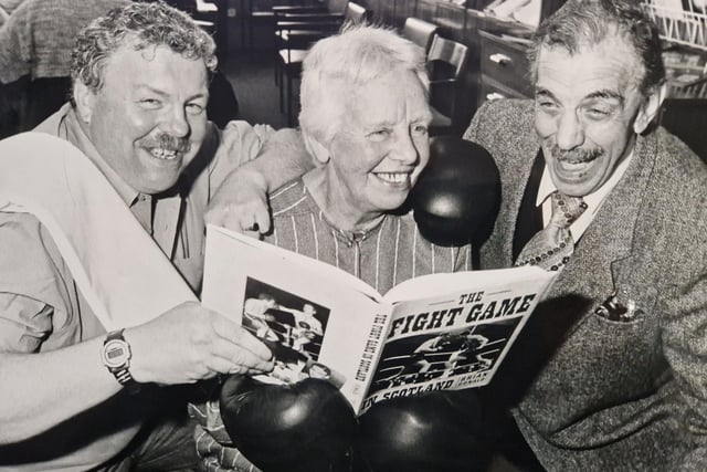 The 1988 launch of The Fight Game, written by renowned boxing journalist Brian Donald who is pictured (left) with Councillor Elizabeth Henderson, who was vice chair of Glenrothes College Council, and Tiny Clephene, a boxer. Picture by David Cruickshanks, staff photographer, Glenrothes Gazette