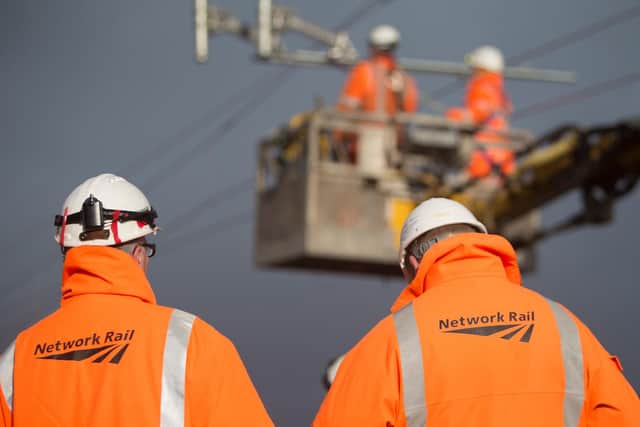 Overhead line workers on the Fife rail network