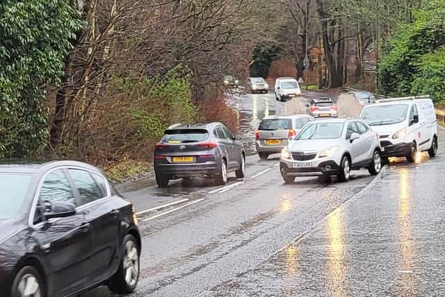 Drivers navigate the flooded Oriel Road in Kirkcaldy (Pic: Alistair Thomson)