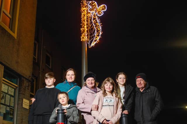 Lesley Reid, pictured with husband John and family, who has been organising the campaign to raise funds for Kinghorn Christmas lights. Pic: Scott Louden.