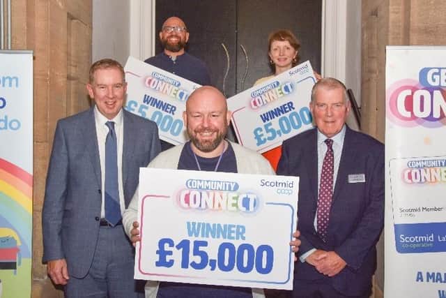 Neil Freir from Fairway Fife (left,) Danni Szerszynska (right) and Gary Shaw Edinburgh Young Carers (front) pictured with John Brodie and Eddie Thorn (Scotmid) (Pic: Submitted)