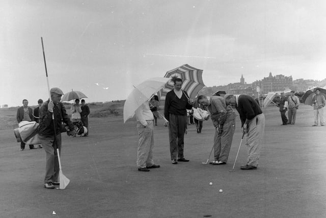 Phil Rodgers, Joe Carr, Christy OConner and John Panton during a practise round at the St Andrews Open Championship in 1964.
