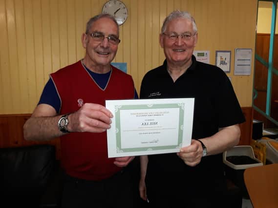 Sandy (left) presenting Neil with his certificate of honorary membership