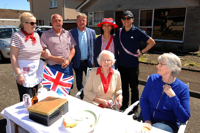 A street party was held in Oriel Crescent, Kirkcaldy
Pictured are Isobel and Jim Neilson, David Torrance, MSP, Fay and Paul Chung, and seated , Margaret Torrance and Maria Oliver.