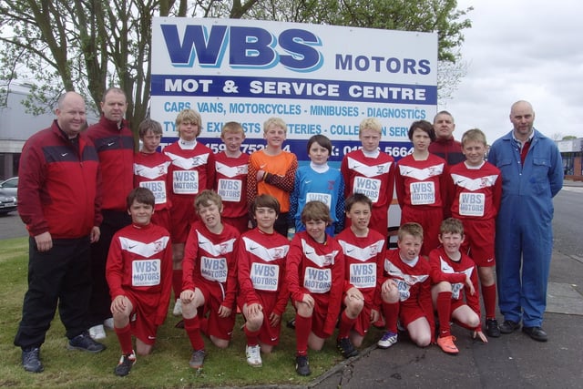 Glenrothes Strollers 2000 football team proudly showing off their new kit for the forthcoming season ith kit sponsors WBS Motors MOT & service centre at Eastfield Industrial Est Glenrothes.