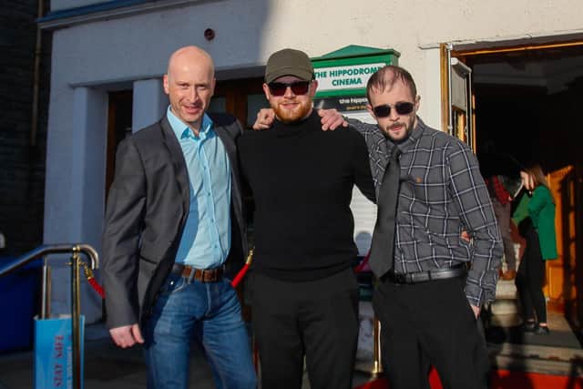 Actor Paul Lapsley with writers/directors Gary Wales and David Penman outside the Hippodrome.  Pic: Scott Louden.