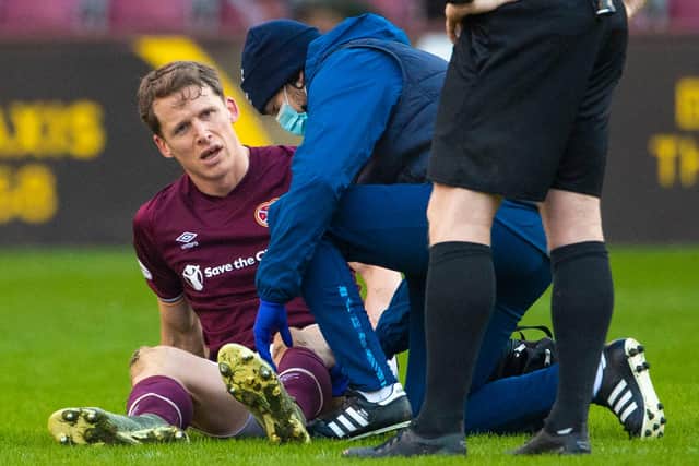 Hearts' Christophe Berra receiving treatment for an injury during their Championship match versus Raith Rovers at Tynecastle Park in Edinburgh on January 23, 2021 (Photo by Paul Devlin/SNS Group)