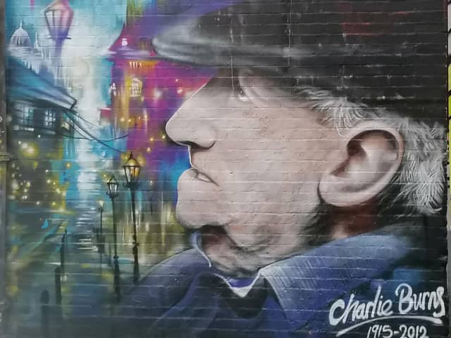 Mural in Brick Lane, London, in tribute to much loved local man, Charlie Burns., the 'King of Bacon Street' who died aged 96.