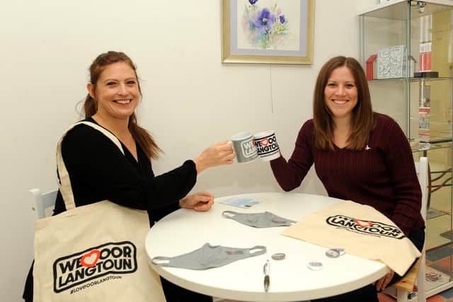 Heather Stuart, CEO Fife Cultural Trust and Lauren Parry from Greener Kirkcaldy with the new 'Love Oor Lang Toun' merchandising. Pic: Fife Photo Agency.