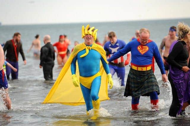 The new year's day Loony Dook on January 1, 2020 at Kirkcaldy beach - the event had a superhero theme. This January there is a Disney theme. Pic: Fife Photo Agency.