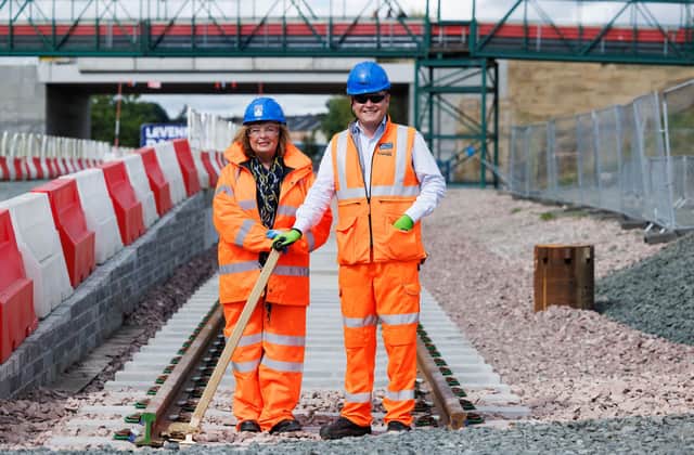 Fiona Hyslop, Scotland's Transport Minister with Alex Hynes, managing director of Scotland's Railyway, at Leven as the track laying is completed on the Levenmouth Rail Link.  (Pic: Network Rail)