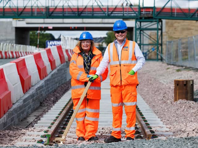 Fiona Hyslop, Scotland's Transport Minister with Alex Hynes, managing director of Scotland's Railyway, at Leven as the track laying is completed on the Levenmouth Rail Link.  (Pic: Network Rail)