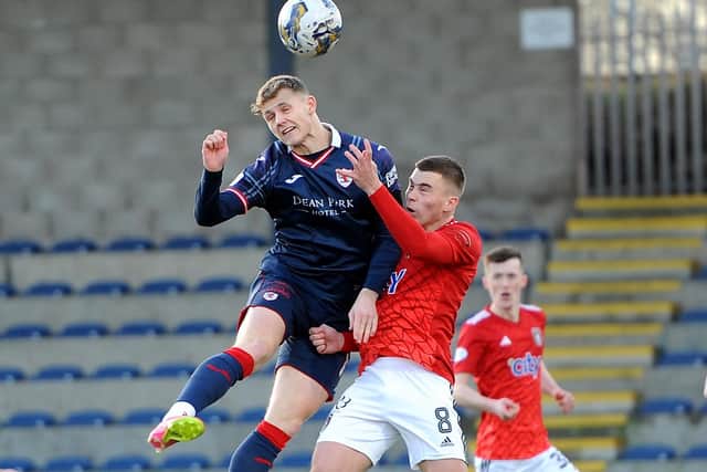 Jack Hamilton beating Jack Thomson to an aerial ball during Raith Rovers' 2-1 loss at home to Queen's Park on Saturday (Pic: Fife Photo Agency)