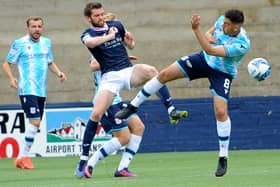 Raith Rovers' Sam Stanton coming up against Dundee's Shaun Byrne at Kirkcaldy's Stark's Park on Saturday (Picture: Fife Photo Agency)