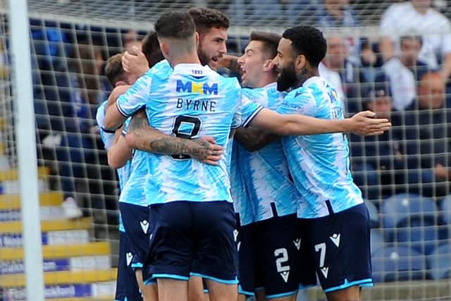 Dundee players celebrating the 13th-minute Josh Mulligan goal that earned them victory at Kirkcaldy's Stark's Park on Saturday (Picture: Fife Photo Agency)