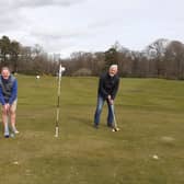 Raymond Johnston and Martin Christie from the club have a go at Park Gowf.