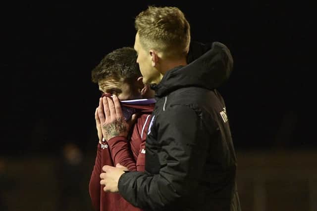 Bobby Linn is inconsolable after the Scottish Premiership play-off semi-final second leg between Arbroath and Inverness at Gayfield two years ago