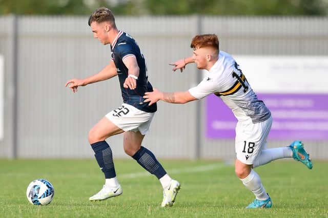 Ethan Ross of Raith Rovers eludes Dumbarton's Finlay Gray (photo by Dave Johnston/Alba Pictures)