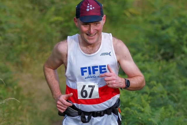 Neil Mitchell running in the 5.4km Law Breaker Hill Race at Tillicoultry (Pic: Gordon Donnachie)