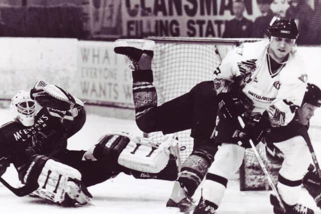 Ice hockey - Doug Marsden (Fife Flyers) in action against Sheffield Steelers - netminder Wayne Cowley, and David Longstaff. March 1996. (Pic: Ian Alexander)