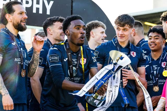 Paul Nsio lifts the KDM Evolution Trophy won during his successful stint with Raith Rovers last season (Pic by Ross Parker/SNS Group)