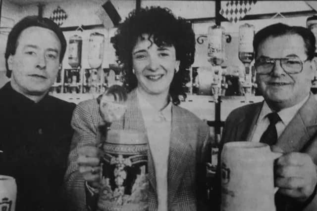 John Baxter Jnr., Linda Hubbard and he dad Fred toast the opening of Panther's