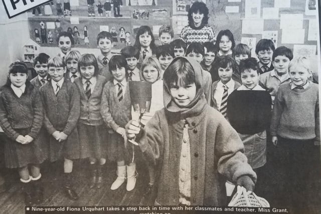 Fiona Urquhart, aged nine, takes a step back in time with her classmates at Kirkcaldy West Primary School.
Also pictured is teacher, Miss Grant.