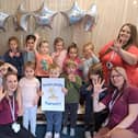 Staff and youngsters at Newcastle Nursery celebrate their positive report (Pic: Submitted)