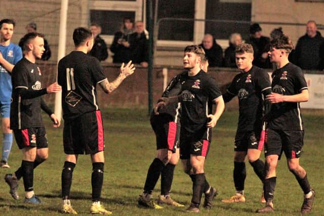Jake Grady takes the acclaim from his team mates after finding the net. Pic by John Stevenson