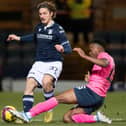 Kieran Ngwenya tackles Dundee's Lorent Tolaj during Raith's dramatic SPFL Trust semi-final success at Dens Park on Wednesday night (Pic by Ross Parker/SNS Group)