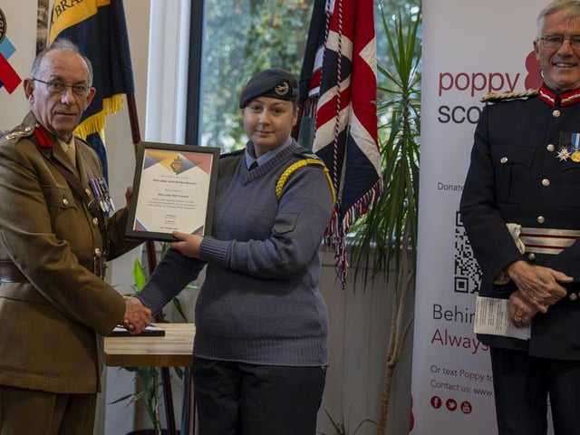 A presentation to Kirkcaldy RAF Cadets by Colonel Jim Kinloch with Robert Balfour, Lord Lieutenant of Fife looking on.