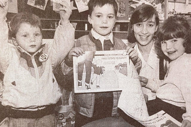 Kirkcaldy's Mothercare lent its support to national child safety week in 1993. Getting the messaage with store manager Audrey Harte are brother Andrew and Scott McDonough (4 and 5) and four-year-old Alison Stewart. 