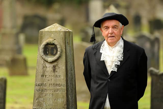 David Potter, who will be taking part in a re-enactment of the last duel in Scotland, standing by George Morgan's gravestone at the Old Kirk in Kirkcaldy. Pic: Fife Photo Agency