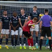 It's the start of the slide for Raith as Simon Murray's free-kick for Queen's makes it 1-1 (Pic by Paul Devlin/SNS Group)