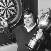 Jocky Wilson in Kirkcaldy with the Embassy Darts World Championship trophy after beating John Lowe in 1982 (Pic: Crauford Tait/TSPL)