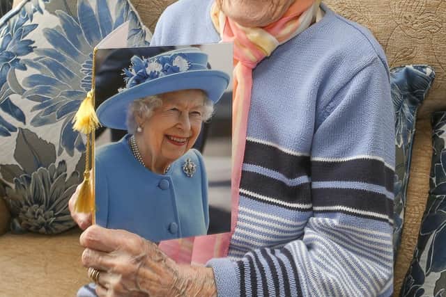 Cupar's Nancy McGill with her card from the Queen to congratulate her on her 100th birthday.