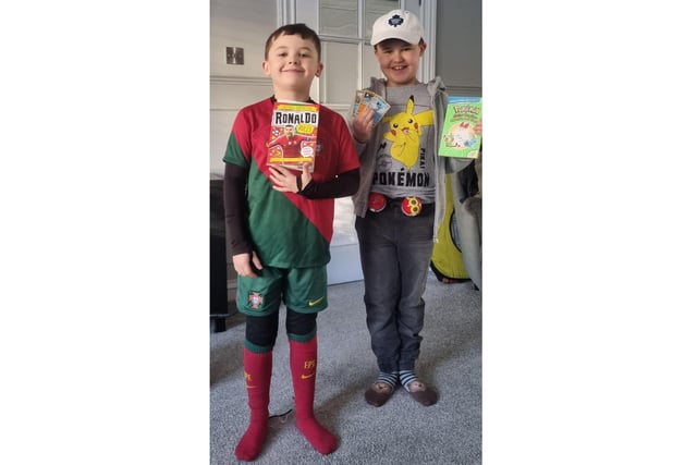 Strathallan Primary pupils Fynn, aged 9, and Logan, aged 7.  The brothers are dressed as Cristiano Ronaldo and Pokemon trainer Ash Ketchum.